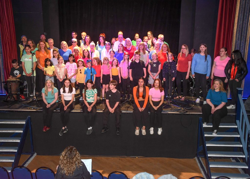 Music Box IV CIC singing on stage